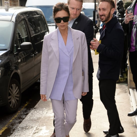 Victoria Beckham Wearing a Purple Suit