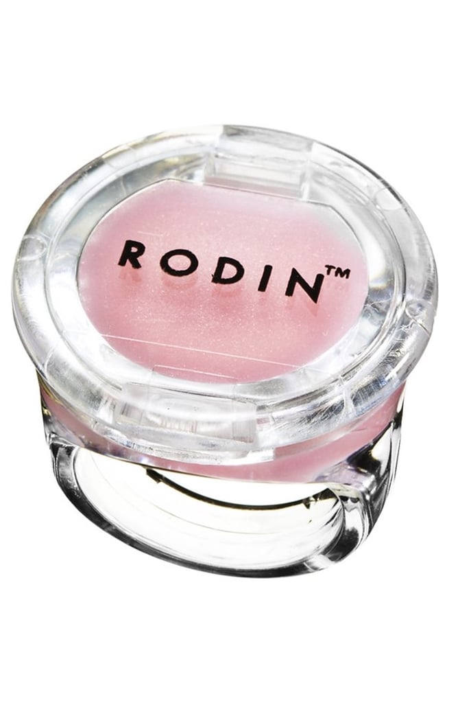 "I love this thing it's such a fun gift! I think anyone can appreciate this but especially a teenager. This is one of those throwback lip balm rings but done classy. Rodin's packaging is gorgeous and minimal and the products are all very simple. It's Jasmine and Neroli scent — two of my favorites."  
Rodin Olio Lusso Lip Balm Ring  ($15)