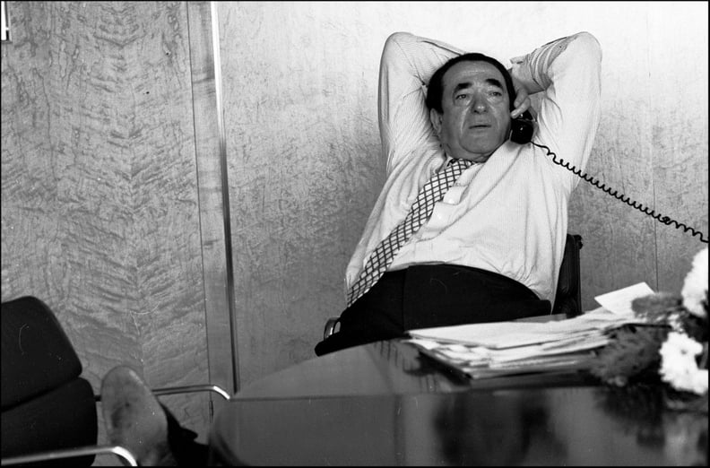 Robert Maxwell reclining at his desk while on the telephone, 1987. (Photo by Michael Ward/Getty Images)