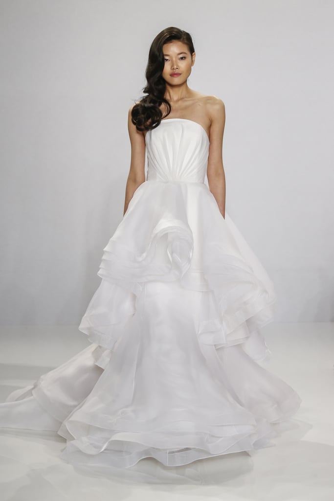Cascading strapless overlay gown.