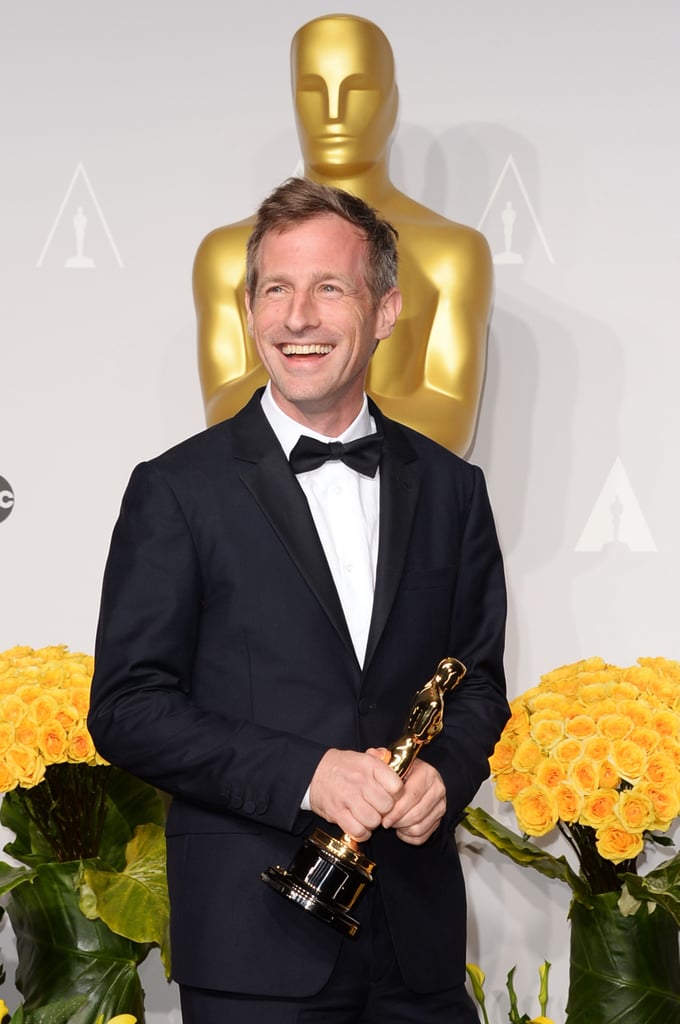 Spike Jonze smiled after winning best original screenplay for Her.