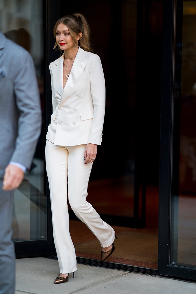 Gigi Hadid White Suit and Bear Bag