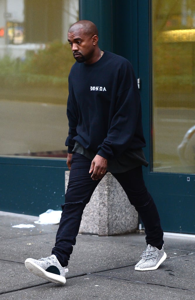 The star was also spotted wearing his Yeezy Boost 350s the next day ...