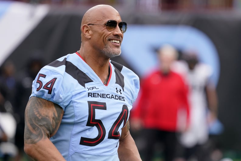 ARLINGTON, TEXAS - FEBRUARY 18: XFL owner Dwayne Johnson stands on the field before the game between the Arlington Renegades and the Vegas Vipers at Choctaw Stadium on February 18, 2023 in Arlington, Texas. (Photo by Sam Hodde/Getty Images)
