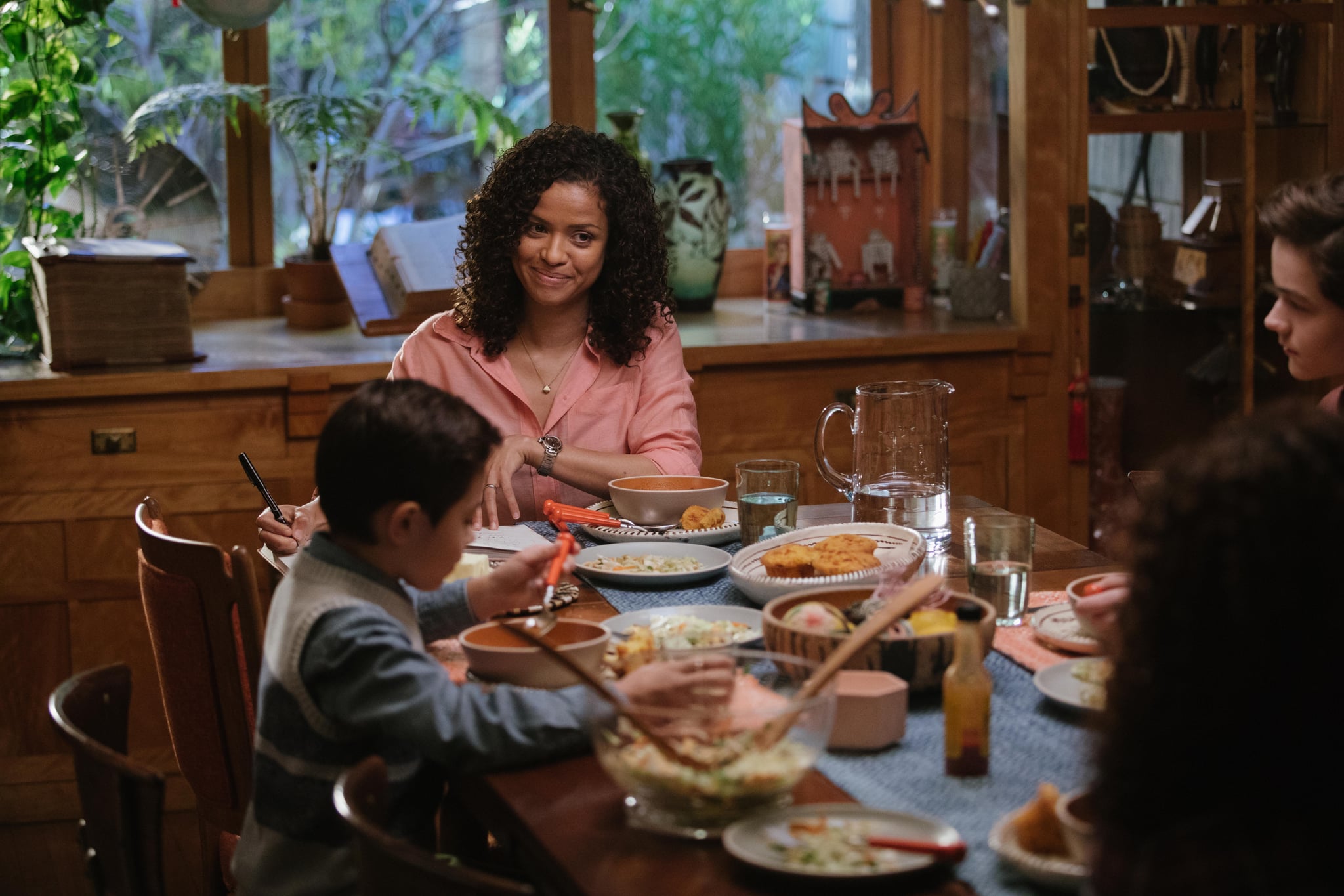 Gugu-Mbatha-Raw is Mrs. Murry, Deric McCage is Charles Wallace Murry and Levi Miller is Calvin O'Keefe in Disney's A WRINKLE IN TIME.