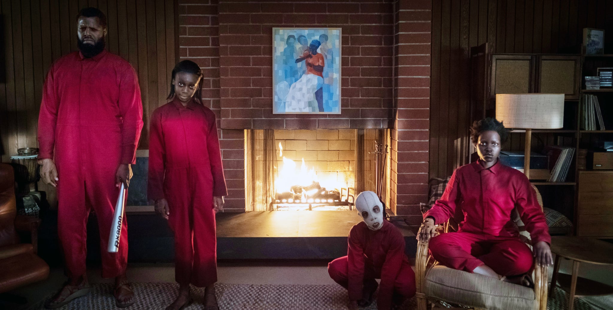 US, The Wilson family doppelgangers as portrayed from left:  Winston Duke, Shahadi Wright Joseph, Evan Alex (wearing mask), Lupita Nyong'o, 2019. ph: Claudette Barius /  Universal / courtesy Everett Collection