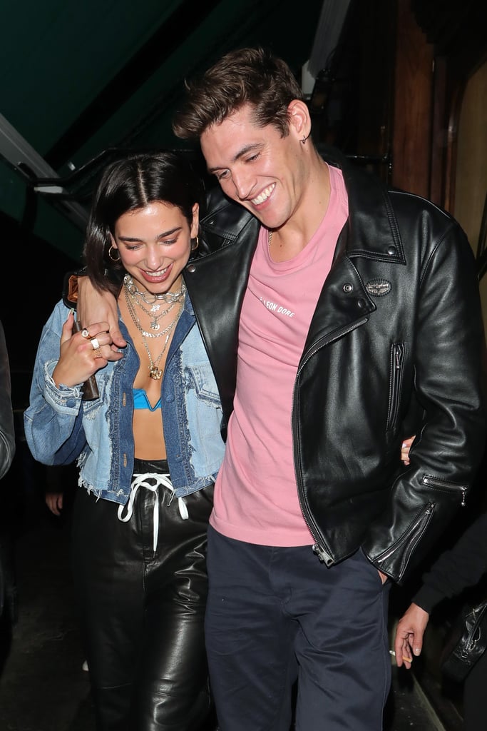 While Dua Lipa may fill your break up playlist with anthem after anthem, don't be under the illusion that she's a single lady. The British starlet is happily dating model, chef, and writer of the cookbook The Dirty Dishes, Isaac Carew. The pair aren't shy when it comes to sharing their love online, often exchanging cyber sweet nothings. Though the couple may have been on and off over the years, after recently travelling together, they seem to be better than ever. From dressing up as Mick and Bianca Jagger for Halloween to posing in swimwear, read on to see their sweet love. 

    Related:

            
            
                                    
                            

            68 Dua Lipa Photos That Are, Indeed, Hotter Than Hell
