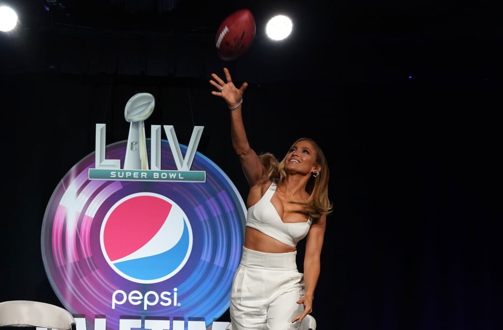 Jennifer Lopez's Football Clutch at Super Bowl Press Event