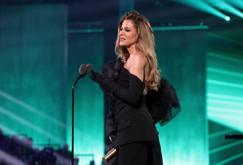 SANTA MONICA, CALIFORNIA - DECEMBER 06: 2022 PEOPLE'S CHOICE AWARDS -- Pictured: Khloé Kardashian accepts the The Reality Show of 2022 award for 'The Kardashians' on stage during the 2022 People's Choice Awards held at the Barker Hangar on December 6, 202