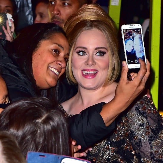 Adele Poses With Fans Outside Radio City Music Hall 2015
