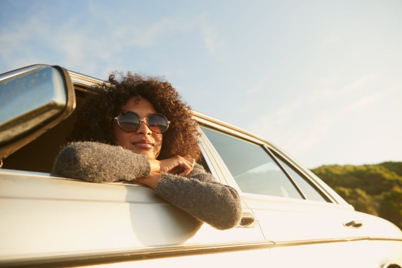 Cropped shot of an attractive young woman leaning out of a car window on a roadtriphttp://195.154.178.81/DATA/istock_collage/a5/shoots/785271.jpg