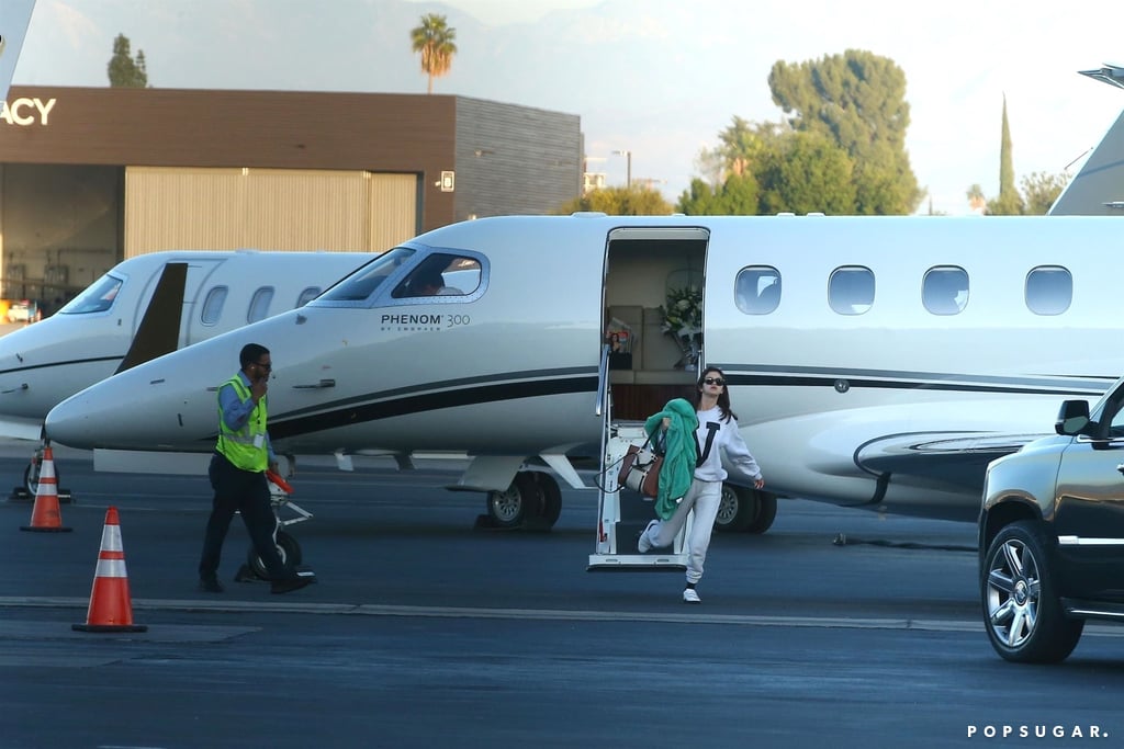 Selena Gomez Wearing Gray Sweatpants on a Plane