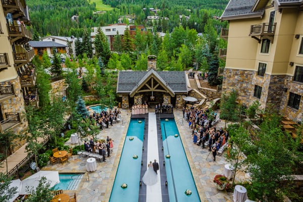Walk on water during your ceremony with a temporary stage over your venue's pool.