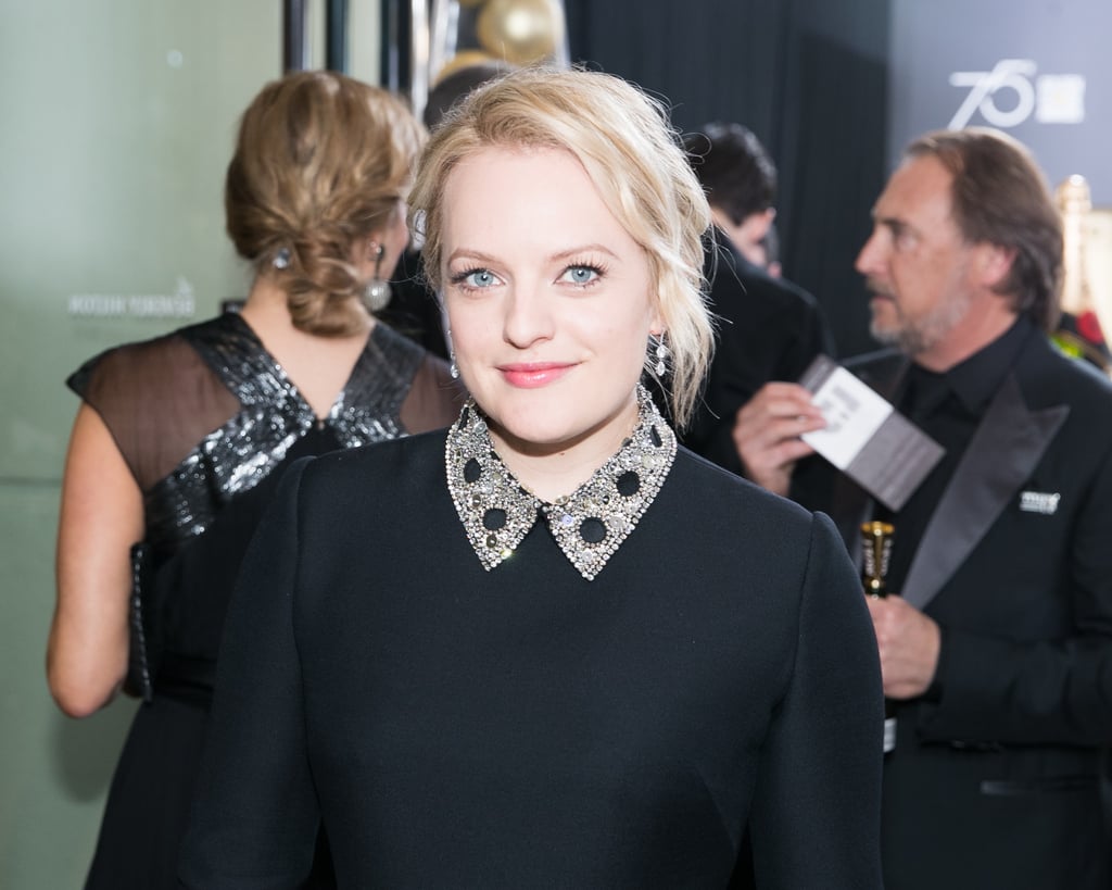 Elisabeth Moss's Dior Haute Couture dress had the most beautiful collar. She also wore Forevermark jewelry.