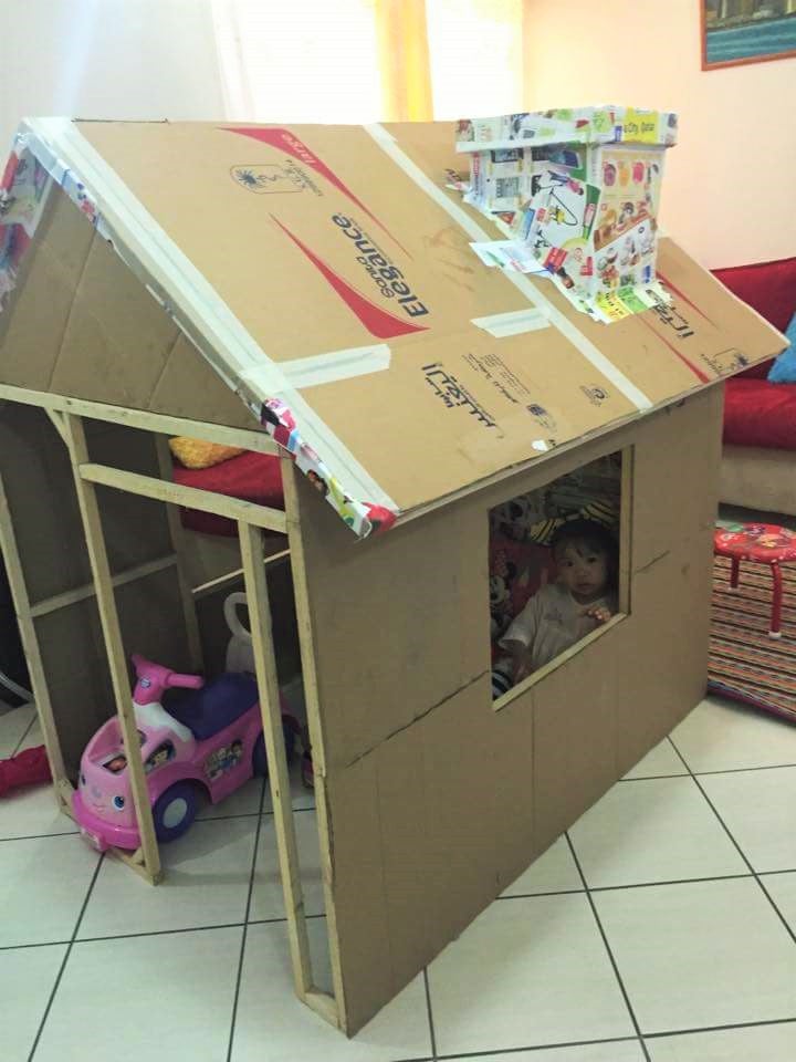 Grandfather Makes Cardboard Playhouse From Cardboard Boxes