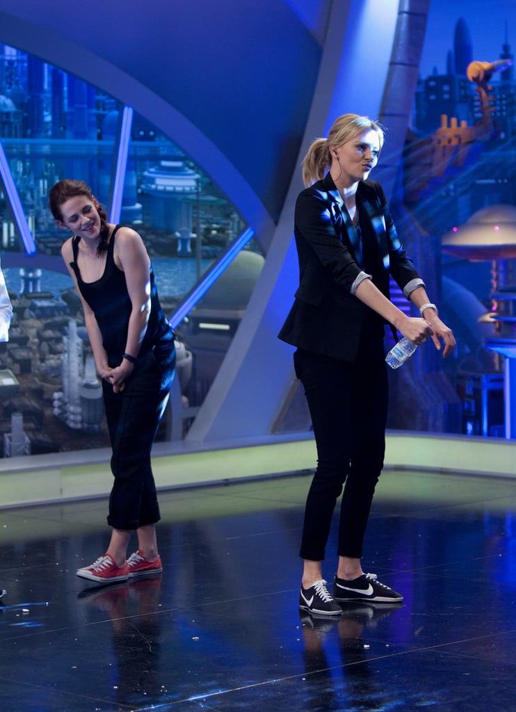 Kristen Stewart and Charlize Theron Play Games and Get Goofy in Spain Kristen Stewart and Charlize Theron Play Games and Get Goofy in Spain