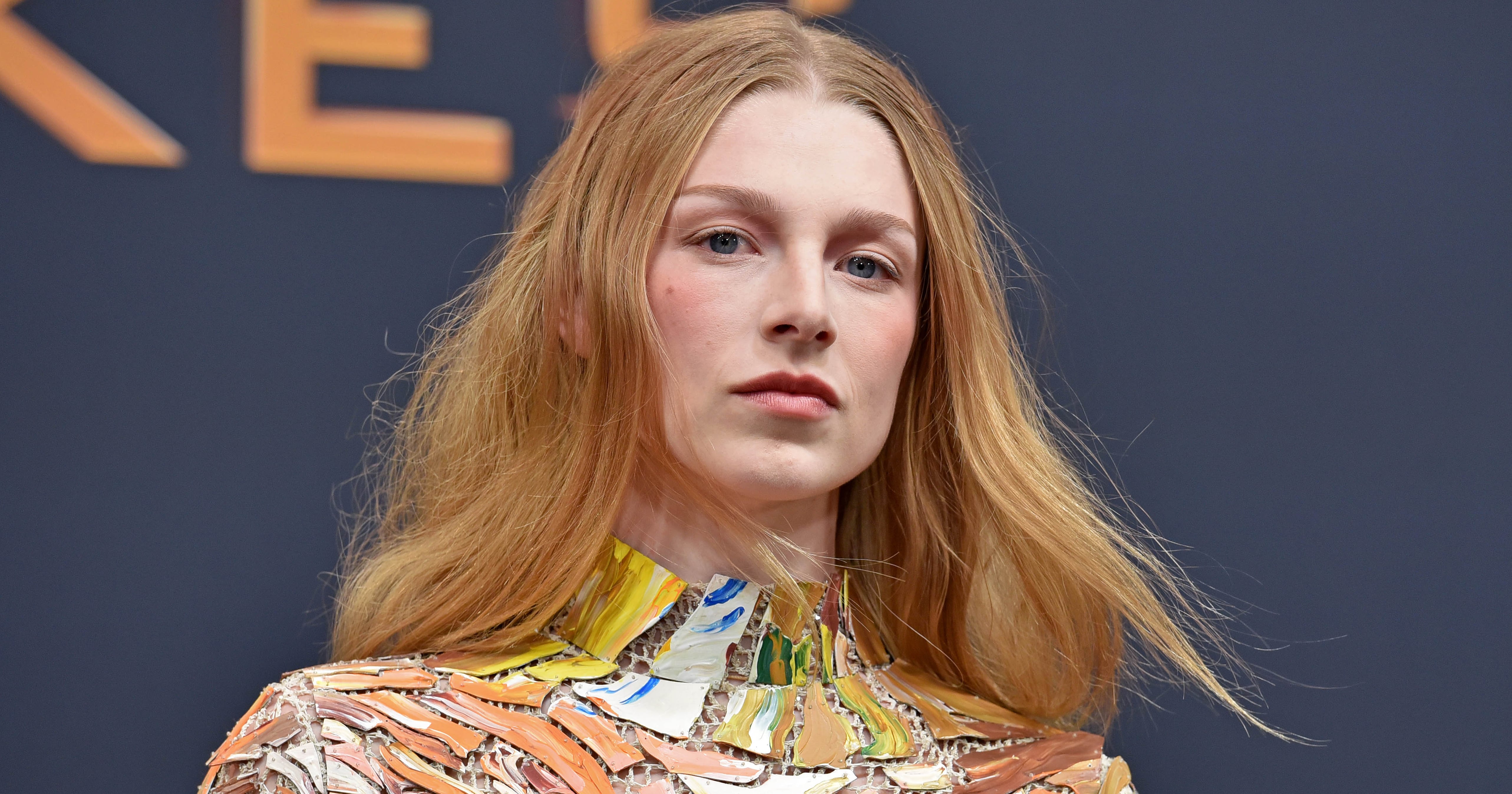 Hunter Schafer Drips Down the Red Carpet in a Hand-Painted Puzzle-Piece Dress