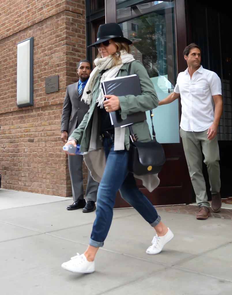 In October 2015, Jennifer styled a green jacket with straight jeans and white sneakers.