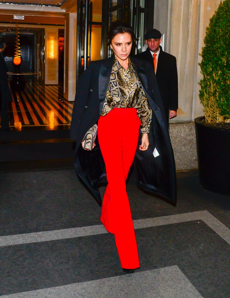 Victoria Beckham Red Pants and Snakeskin Blouse January 2019