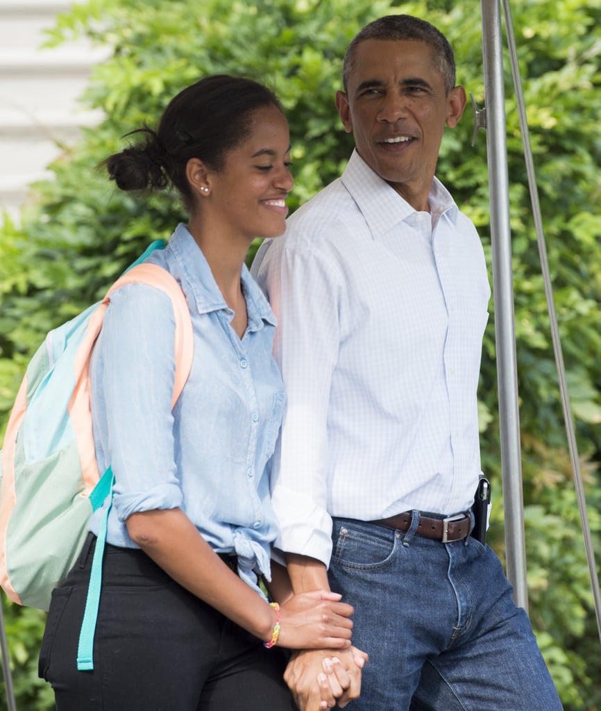 President Obama held hands with his older daughter when they jetted to Martha's Vineyard in August.