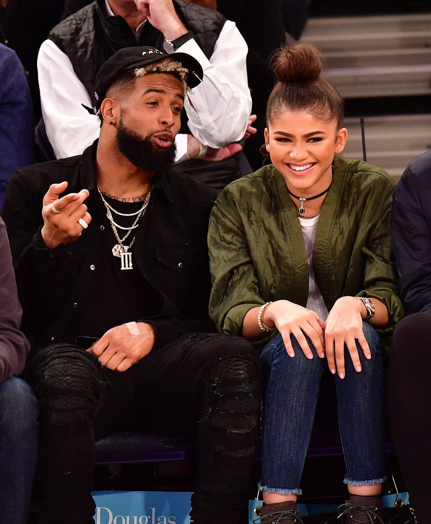 Yes, Zendaya and Odell Beckham Jr. may have been at the same place at the same time on Monday night, and they may have looked really cute and cosy with each other, but they are not dating. The singer/actress and New York Giants wide receiver hung out courtside at a Knicks game, sitting together along with Odell's friend and Zendaya's mum, Claire Stoermer. Their adorable antics (chatting, laughing, sort-of holding hands) naturally led to whispers that love was in the air, but Zendaya quickly headed to Snapchat to clear up any lingering romance rumours; the two were reported to be a couple back in February after attending a Grammys afterparty together, but neither star confirmed or denied it. So whatever their basketball game meetup looked like to you, it was not a date — and we certainly do not think they would make one of the cutest couples ever.