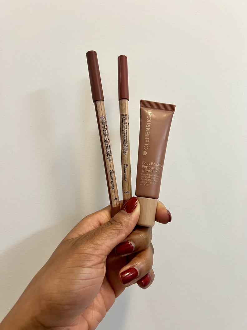 The Make Up For Ever Artist Color Pencils in Anywhere Caffeine and Wherever Walnut, and Ole Henriksen Pout Preserve Peptide Lip Treatment in Crème Brûlée.