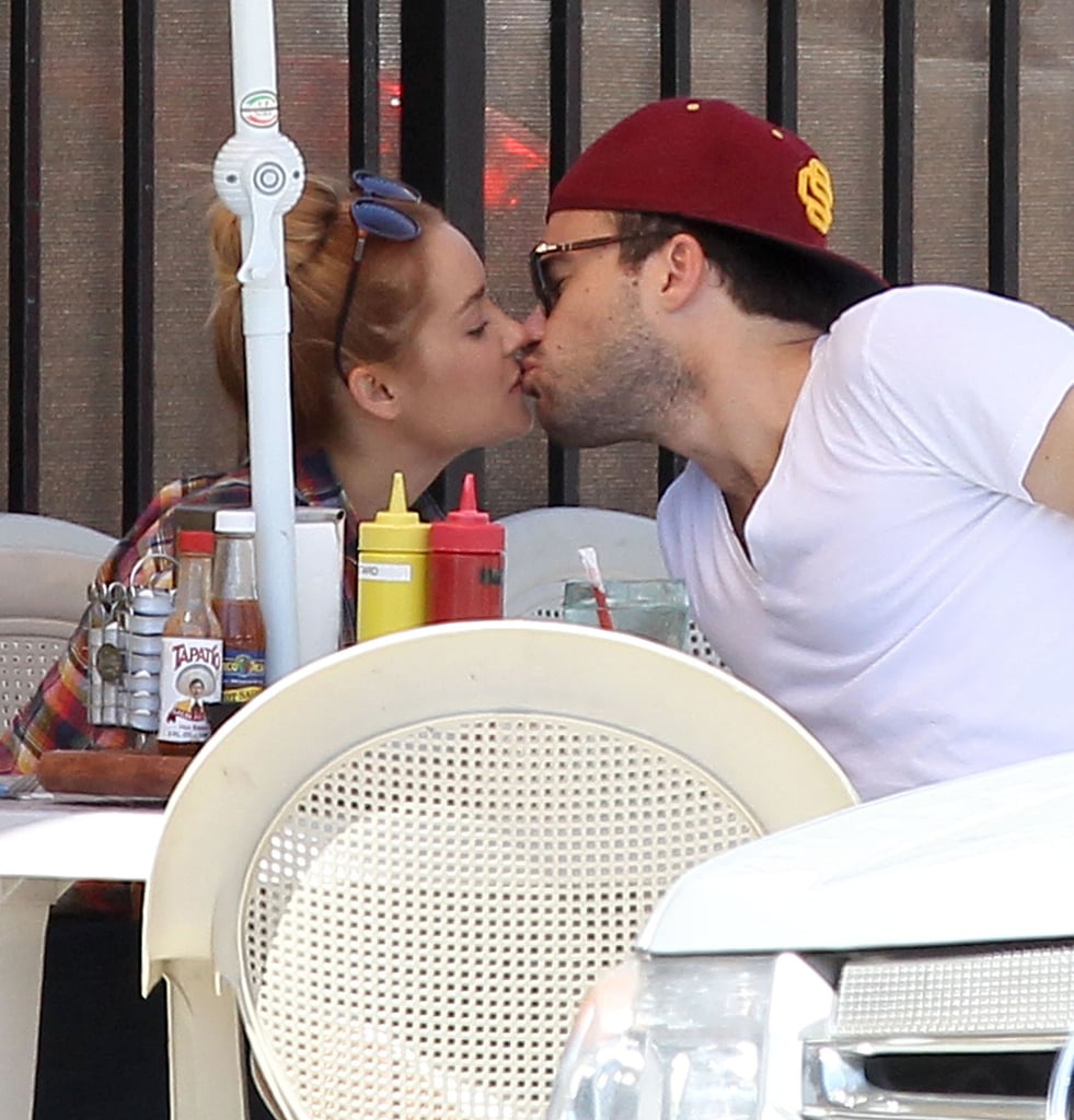 Lauren Conrad and boyfriend William Tell enjoyed a kiss at Nick's Coffee Shop in LA in June 2012.