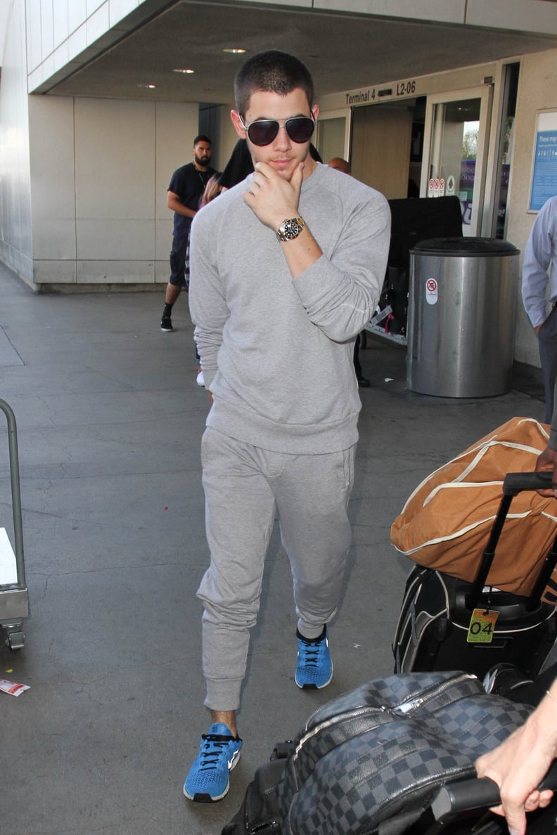Nick Jonas Wearing Sweatpants at the Airport October 2015