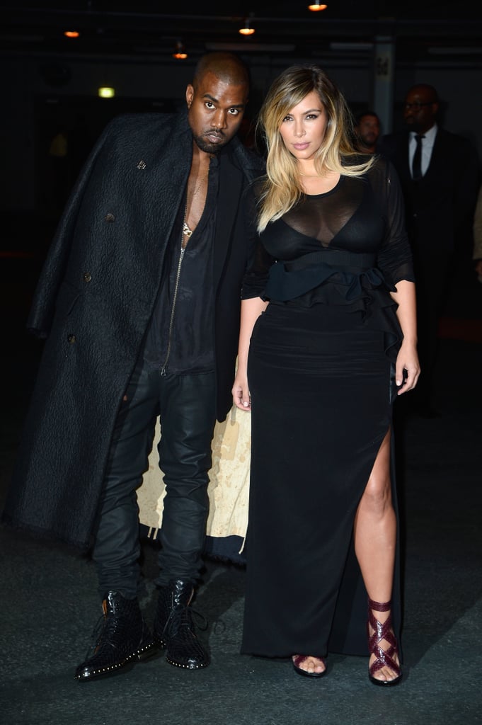 Kim and Kanye sported matching black-on-black looks at the Givenchy runway show during Paris Fashion Week in September 2013.
