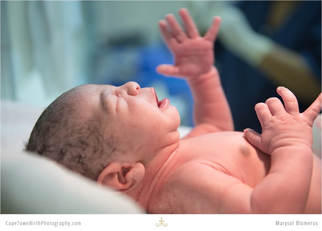 Birth Photos and Sibling Meeting Baby