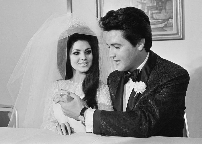 Elvis Presley shows off his wife Princilla's three-carat diamond wedding ring on their wedding day in Las Vegas.