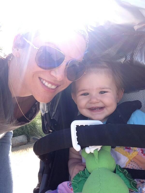 The mom and daughter got some fresh air and giggles on a sunny day.