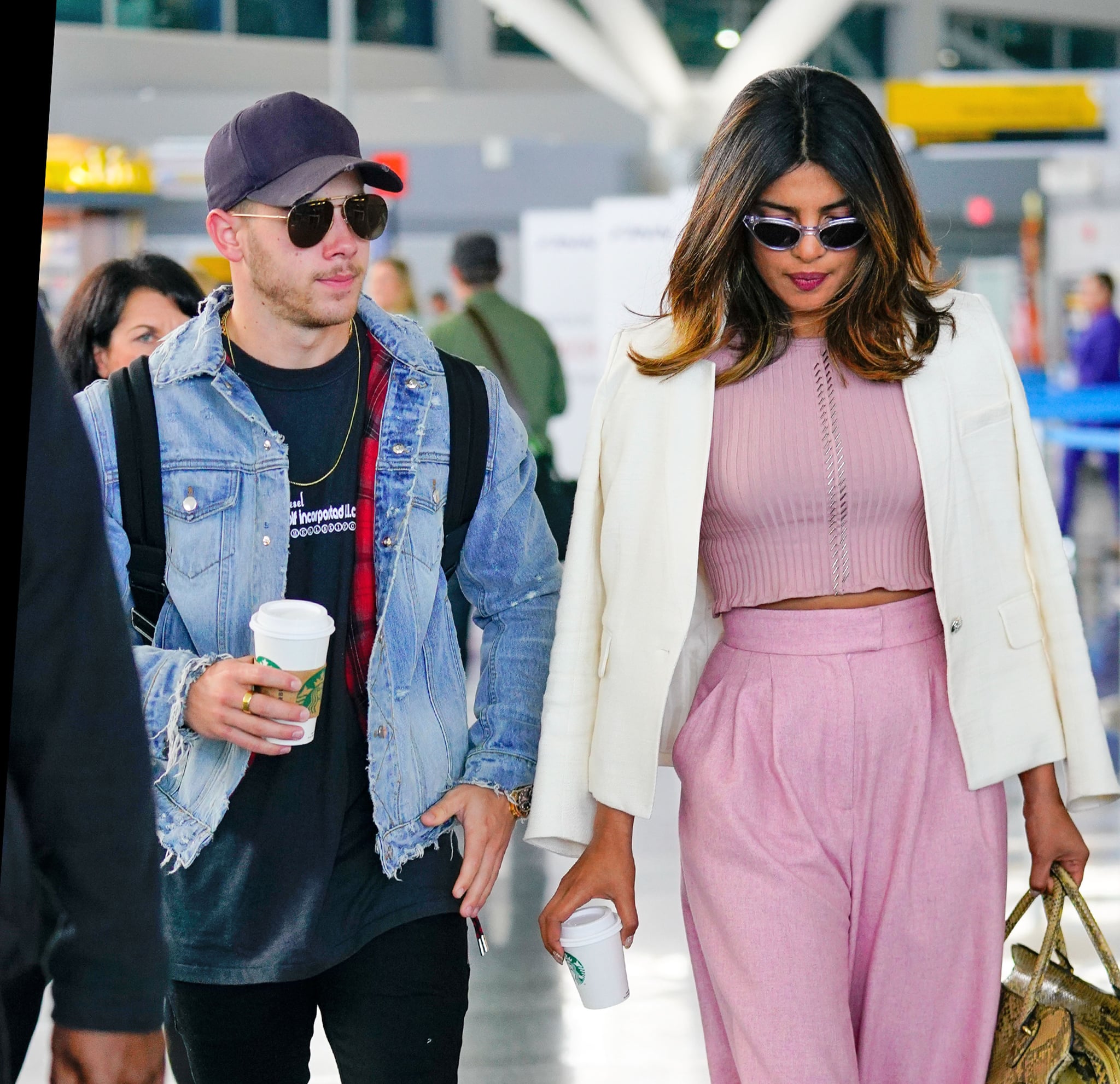 NEW YORK, NY - JUNE 08:  Nick Jonas and Priyanka Chopra at JFK airport on June 8, 2018 in New York City.  (Photo by Gotham/GC Images)