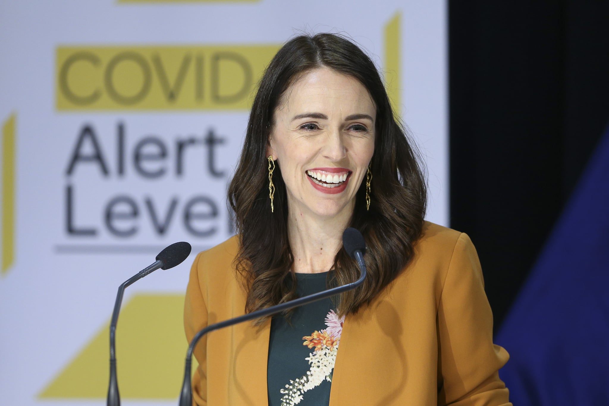 WELLINGTON, NEW ZEALAND - JUNE 08: Prime Minister Jacinda Ardern speaks to media during a post cabinet press conference at Parliament on June 08, 2020 in Wellington, New Zealand. Prime Minister Jacinda Ardern announced that New Zealand will move to COVID-19 Alert Level 1 at midnight on June 8. Alert Level 1 will see people return to work, school, sports events and domestic travel without restrictions. There will also no longer be any restrictions on numbers at mass gatherings. Controls at the borders will remain in place for all people entering New Zealand, including health screening and testing for all arrivals, and mandatory 14-day managed quarantine or isolation. There are no longer any active cases of COVID-19 in New Zealand. (Photo by Hagen Hopkins/Getty Images)