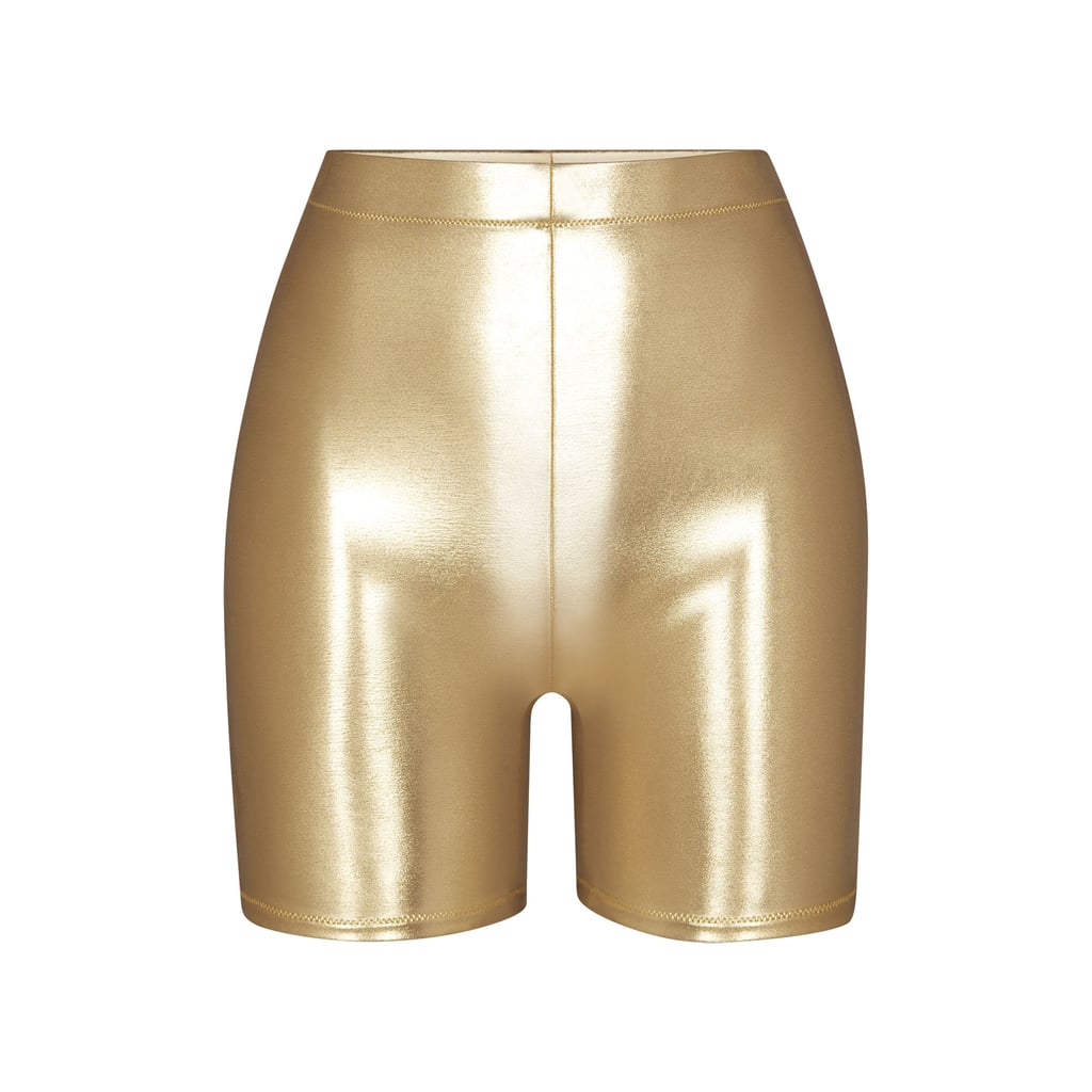 Skims Metallic Swim Mid-Waist Short in Gold ($54)