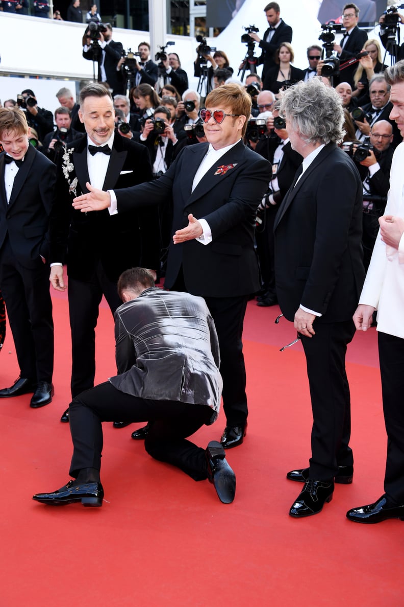 Next, Elton Takes a Moment to Show Off Taron's Shoe-Tying Skills