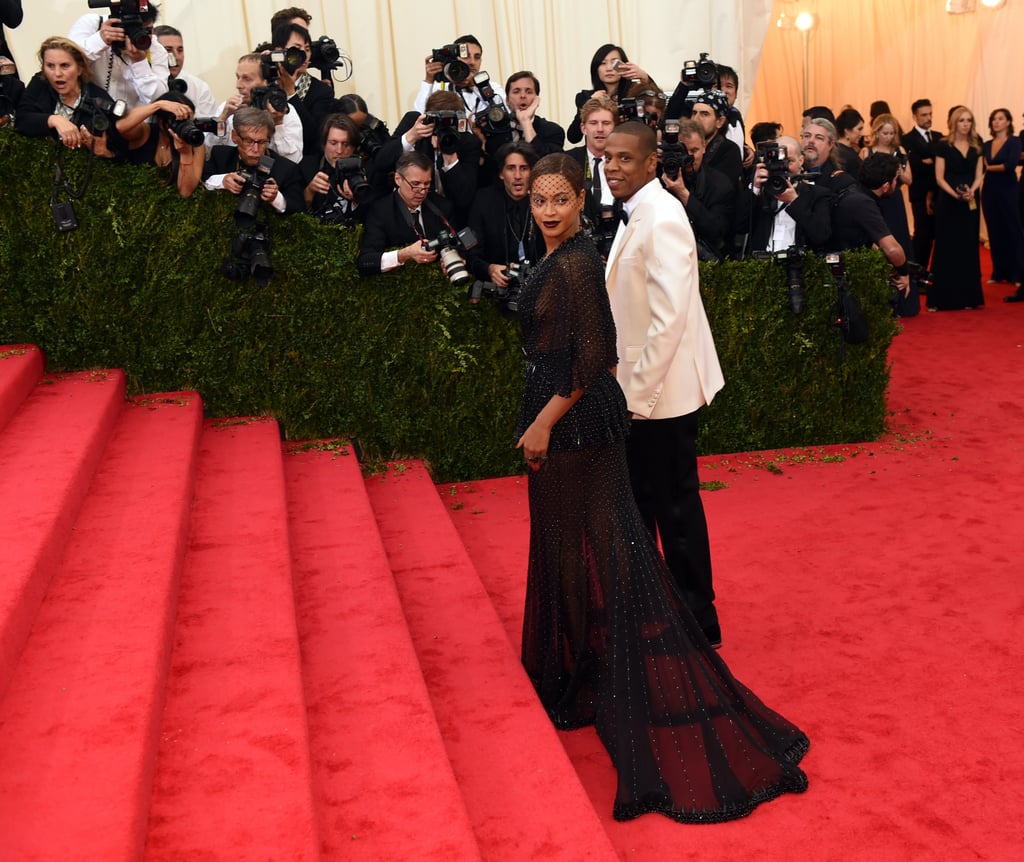Beyoncé and Jay Z paused before the grand staircase.