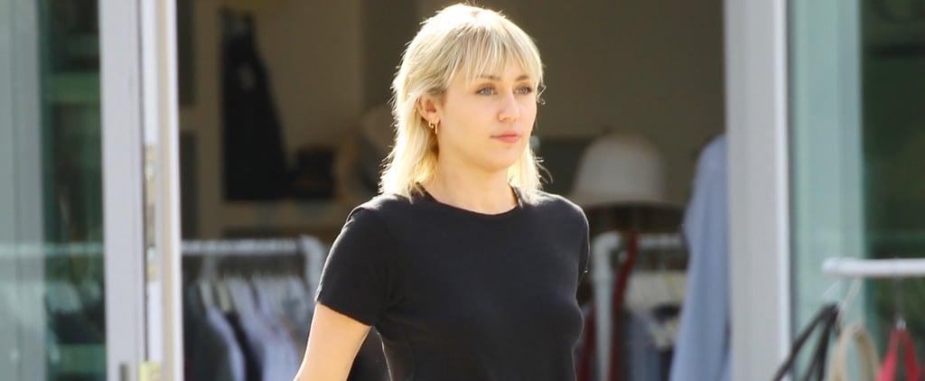 Miley Cyrus Wearing An All-Black Outfit With Leopard Booties