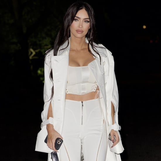 Megan Fox Wears a White Corset, Flare Pants, and Trench Coat