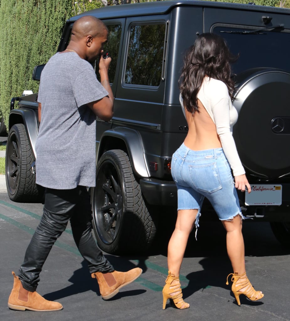 Kim Kardashian in a Backless White Shirt | Photos