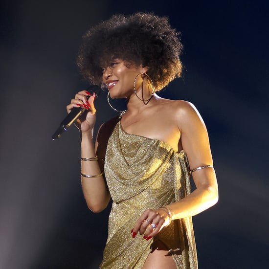 Andra Day Wears Gold Dress With Leg Slit to Essence Awards