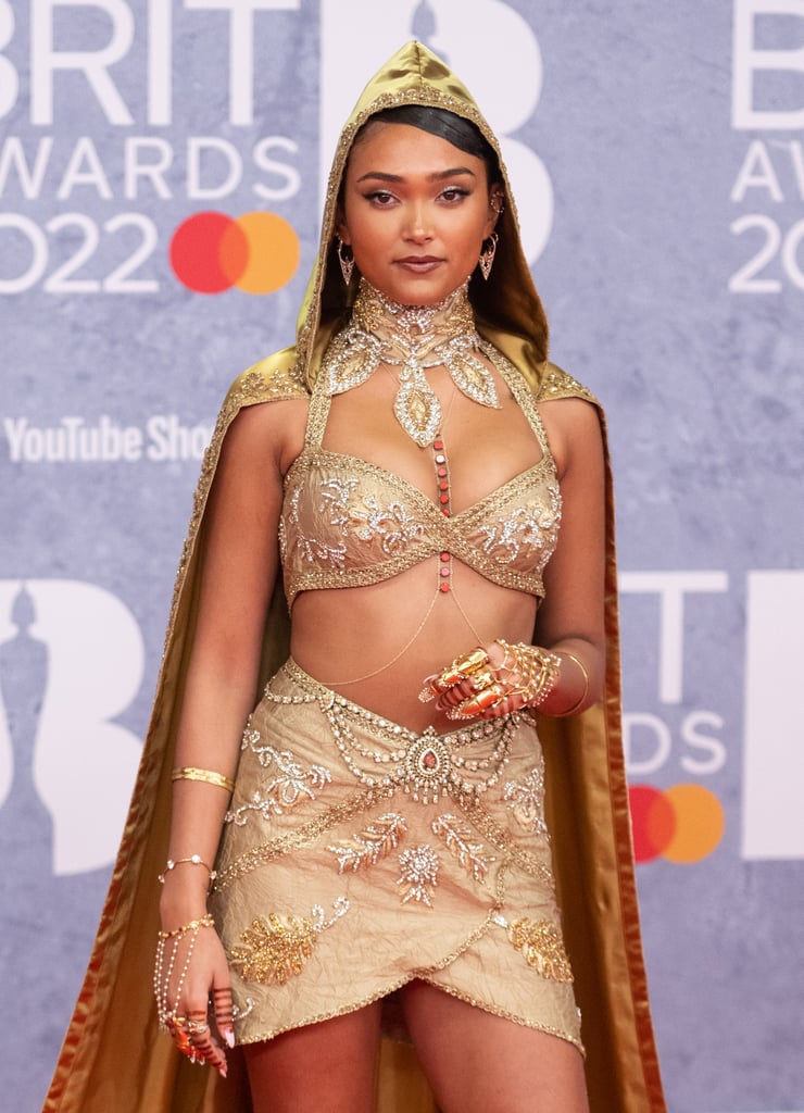 Joy Crookes's Red and Gold Jewellery at the BRIT Awards