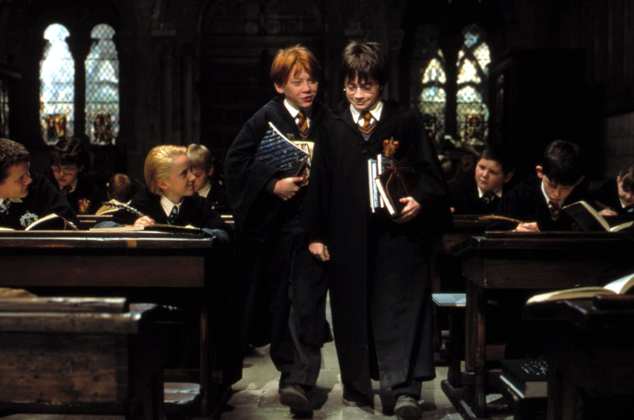 HARRY POTTER AND THE SORCERER'S STONE, Tom Felton, Rupert Grint, Daniel radcliffe, 2001.