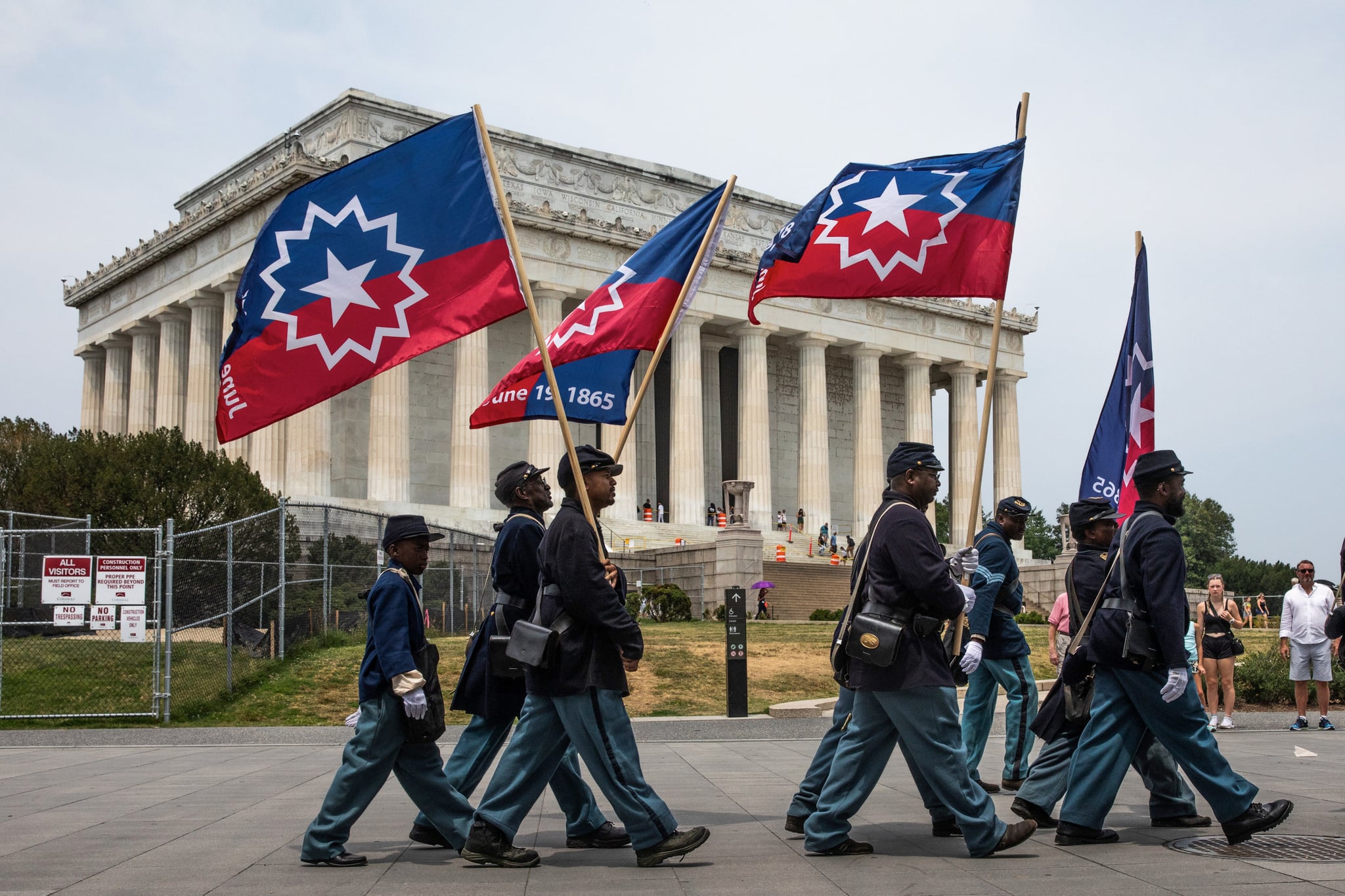 Members of a Civil War re-enactment troop are seen in front of the Lincoln Memorial during Juneteenth celebrations in Washington, D.C., the United States, on June 19, 2023. Celebrated on June 19, the holiday marks the day in 1865 when Union Major General Gordon Granger issued General Order No. 3 in Galveston, Texas, emancipating the remaining enslaved people in the state. For enslaved Americans in Texas, freedom came two and a half years after President Abraham Lincoln issued the Emancipation Proclamation. (Photo by Aaron Schwartz/Xinhua via Getty Images)
