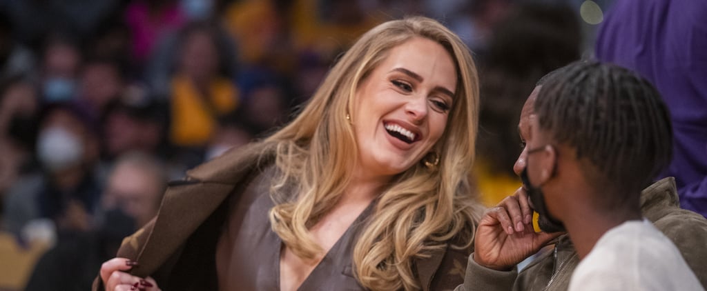 We Can't Stop Watching This Sweet Moment Between Adele and Kid Cudi at the Lakers Game