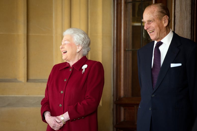 Queen Elizabeth and Prince Philip share a laugh in 2014.