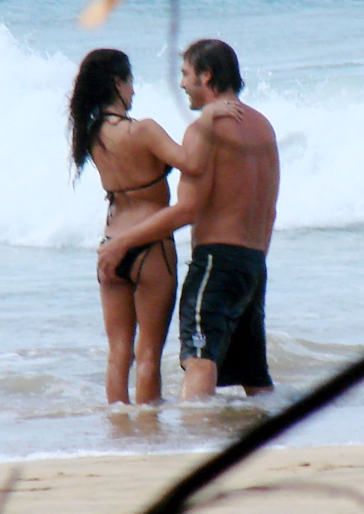 Javier Bardem cuddled up to Penélope Cruz during a vacation in Brazil in January 2008.