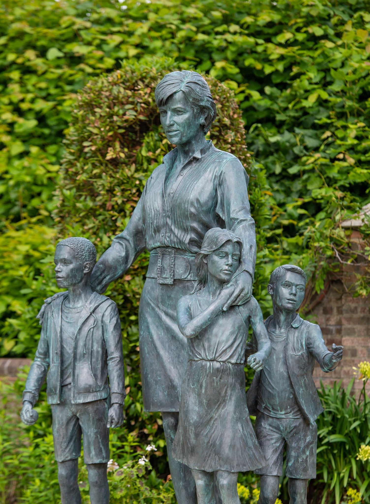 The Princess Diana Statue in The Sunken Garden at Kensington Palace, Prince William and Prince Harry Honour Princess Diana's “Love, Strength and  Character” With New Statue