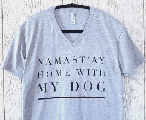 It's called Downward Dog for a reason. 
Namast'ay Home With My Dog Short-Sleeved V-Neck ($28)