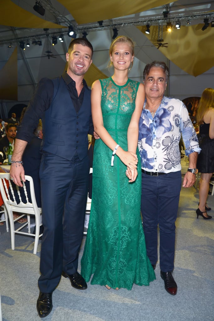 Robin and Toni Garrn posed for a photo.